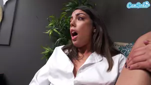 A girl posing at work almost reaching orgasm