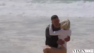 Three girls in sexy outfits and bikinis learned to surf with an instructor
