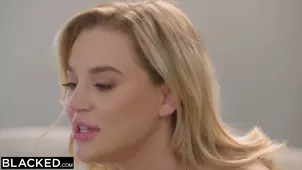 A black man with an enormous dick fucks a sexy blonde with big tits