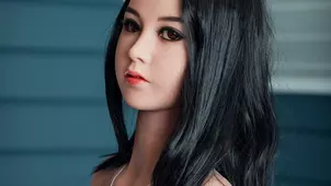 A girl in sexy underwear plays with an erotic toy batting around with allure