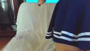 A petite schoolgirl Karina plays with a dildo getting wet