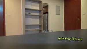 An Asian girl is having a playful time making love in amazing quality