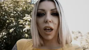 A wet white t shirt does not protect Karma Rx's big boobs from the rain