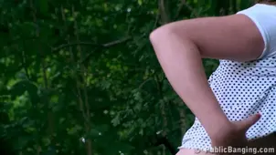 A hot chick fucks with two guys in the forest